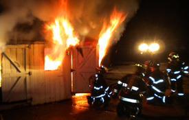 IFCO members put out shed fire during handline drill. (1/23/10)